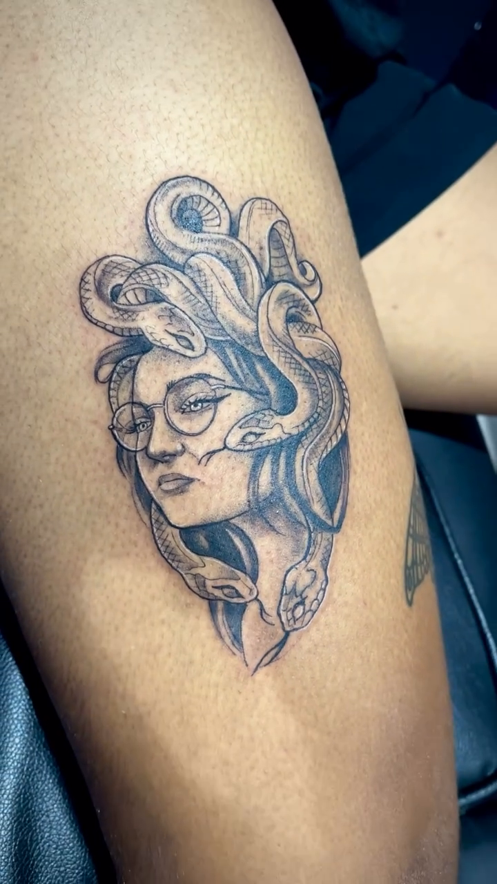 Tattoo by @inknpaint.society โ black_and_grey, realism