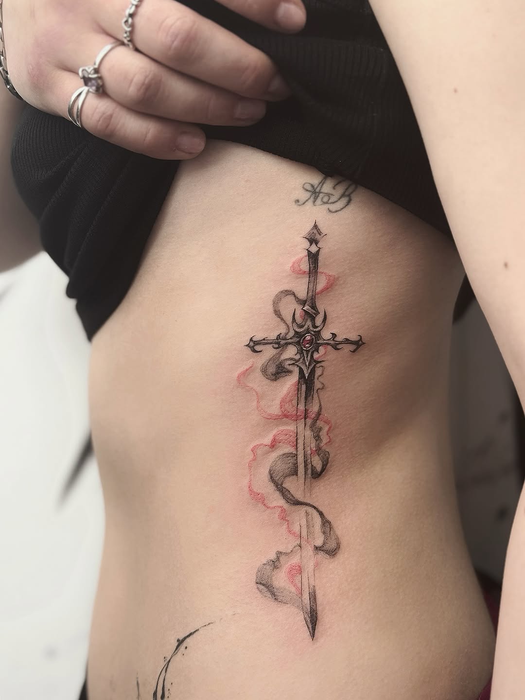Tattoo by @masha.khelik.ttt — fine_line, black_and_grey