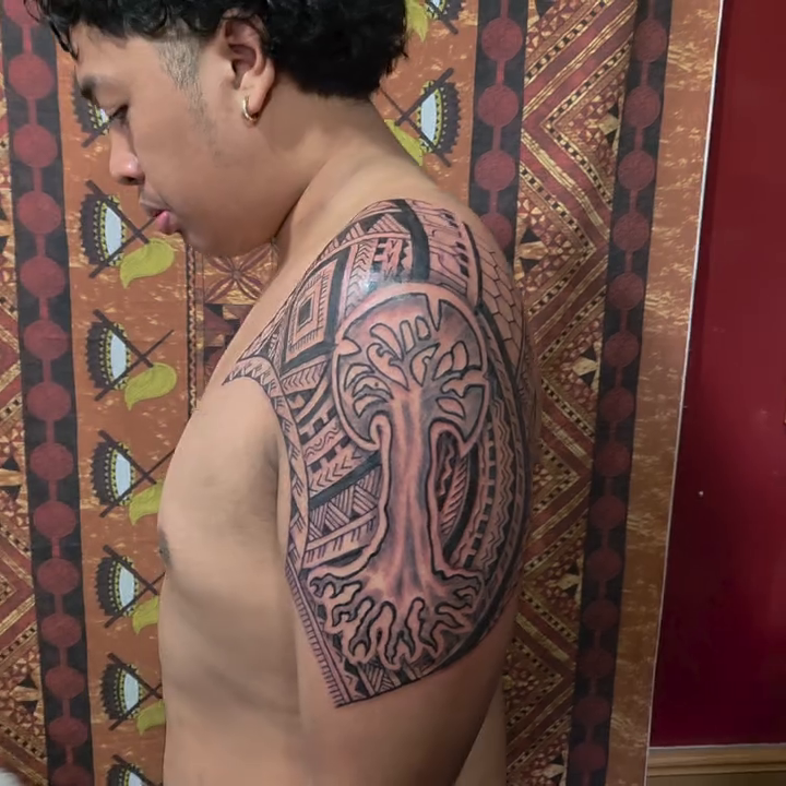 Tattoo by @jeanmichelmanutea โ tribal, blackwork