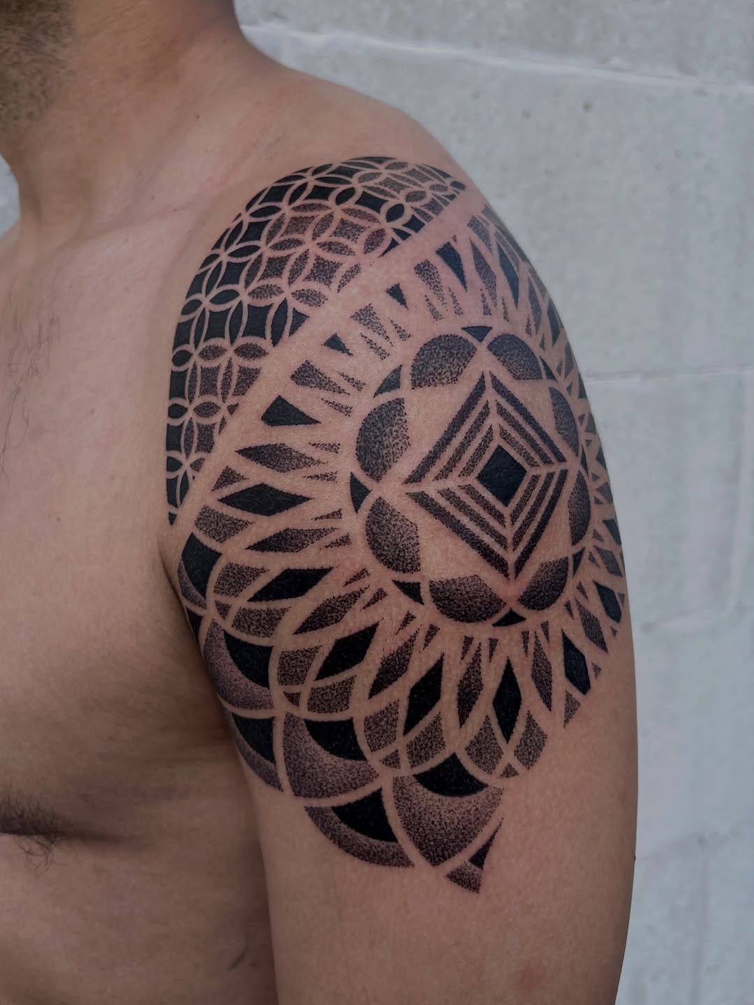 Tattoo by @setharcane — geometric, dotwork