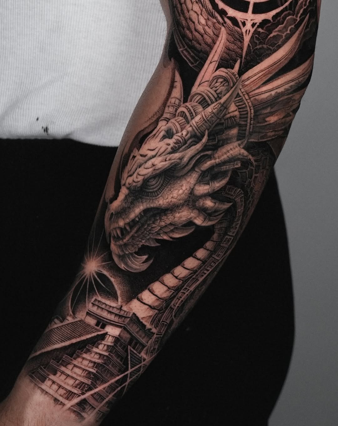 Tattoo by @sumok_tattoo β realism, black_and_grey