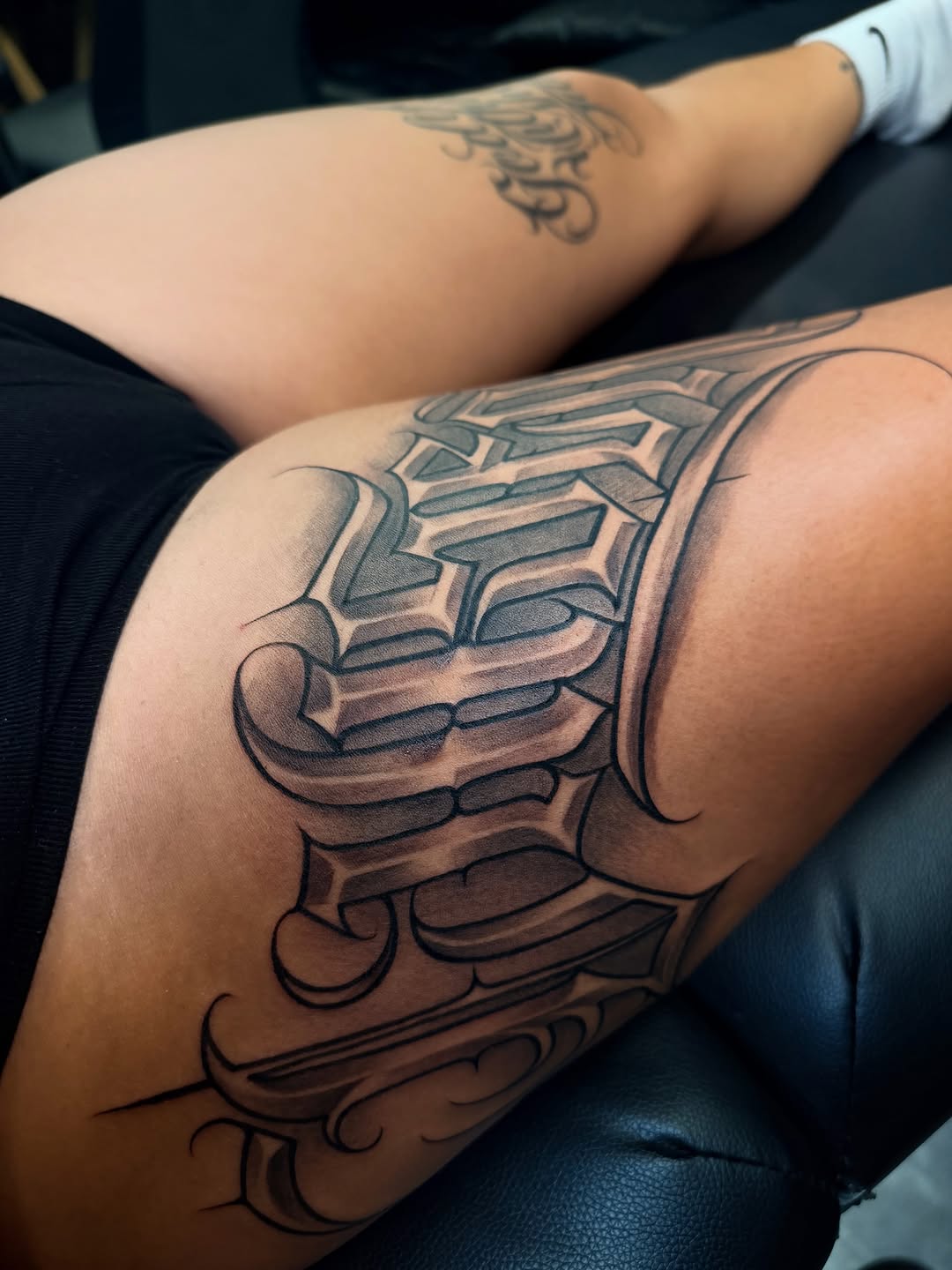 Tattoo by @stillballin6_ — lettering_script, black_and_grey
