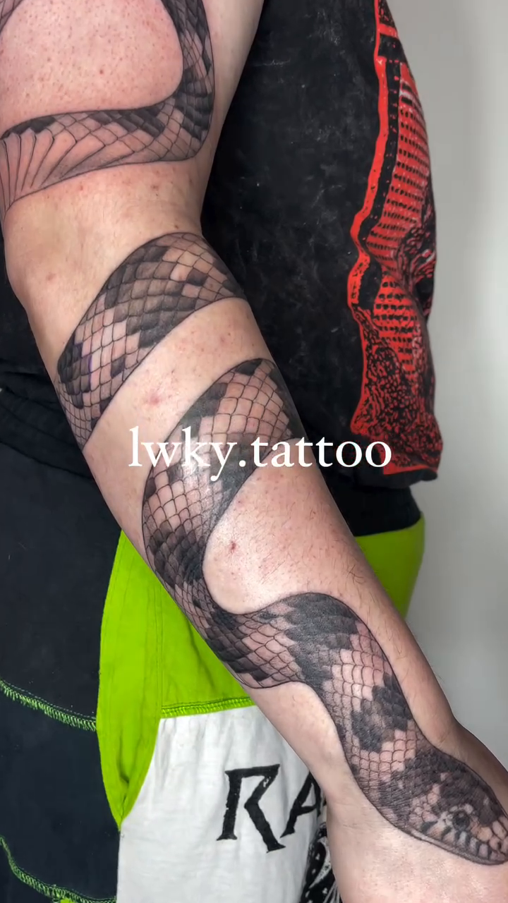 Tattoo by @lwky.tattoo โ realism, black_and_grey