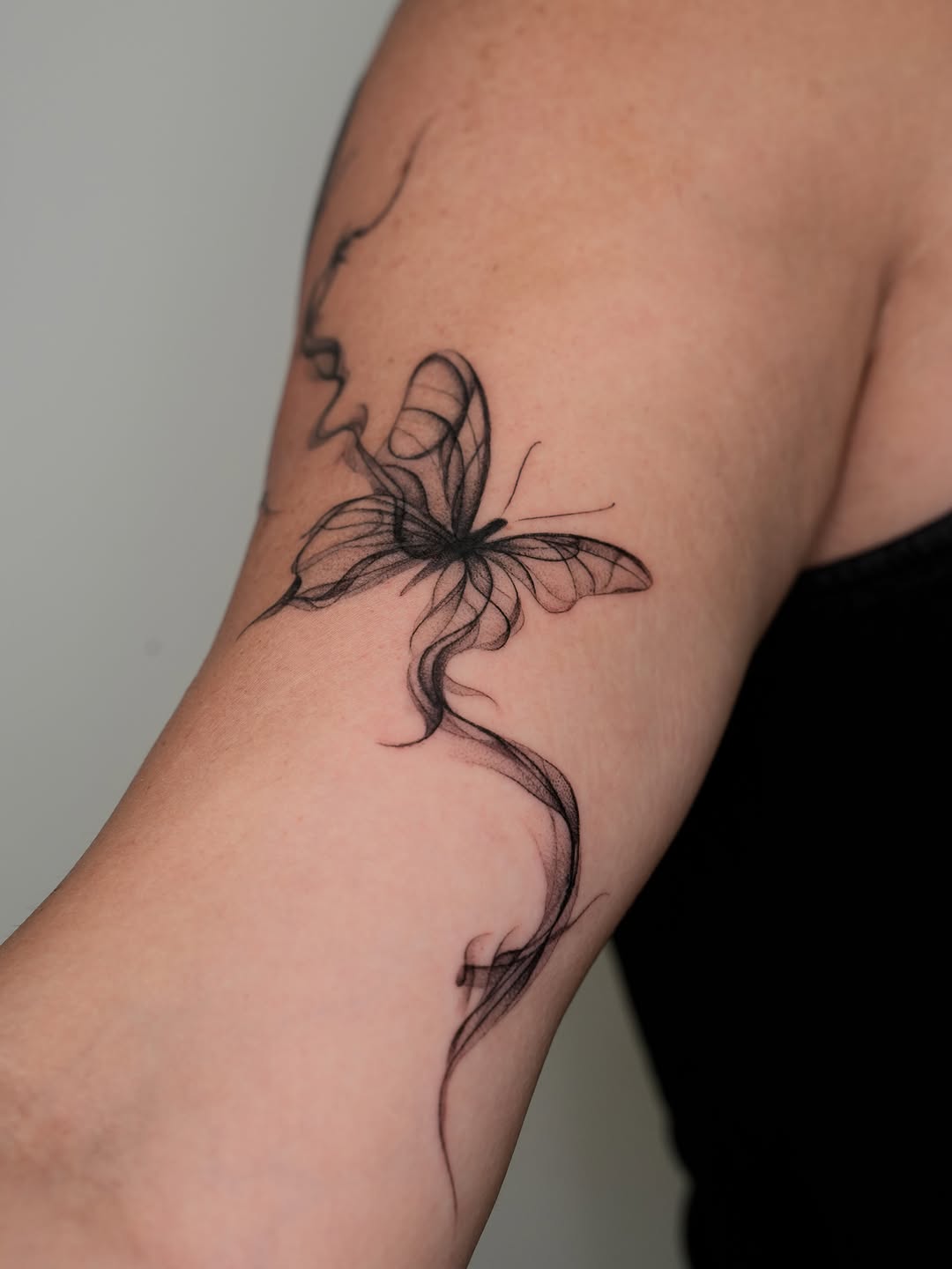 Tattoo by @tattooer_r.tee — fine_line, black_and_grey