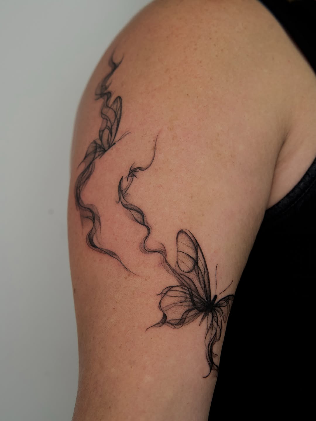 Tattoo by @tattooer_r.tee — fine_line, black_and_grey