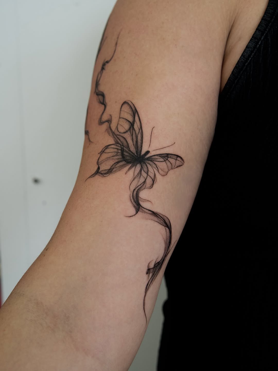 Tattoo by @tattooer_r.tee — fine_line, black_and_grey