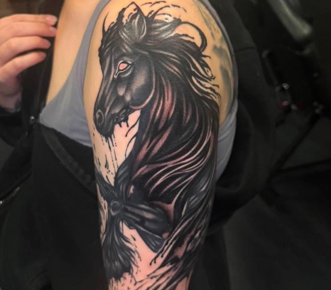 Tattoo by @mischiefinkparlor18 — black_and_grey, realism