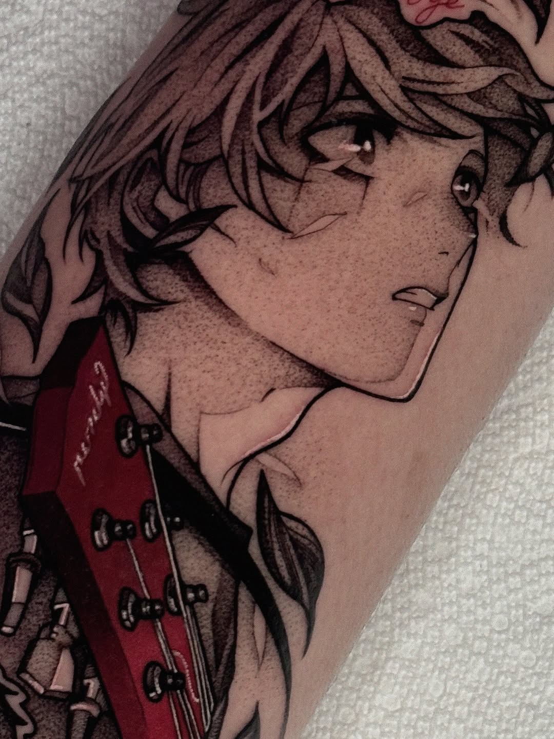 Tattoo by @xq.ink — anime, realism