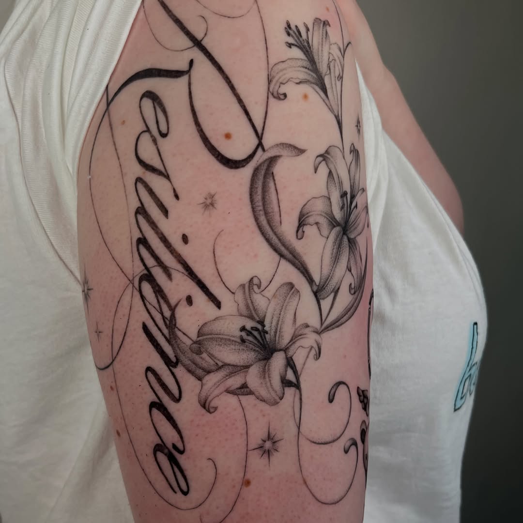 Tattoo by @needleshark — lettering_script, black_and_grey