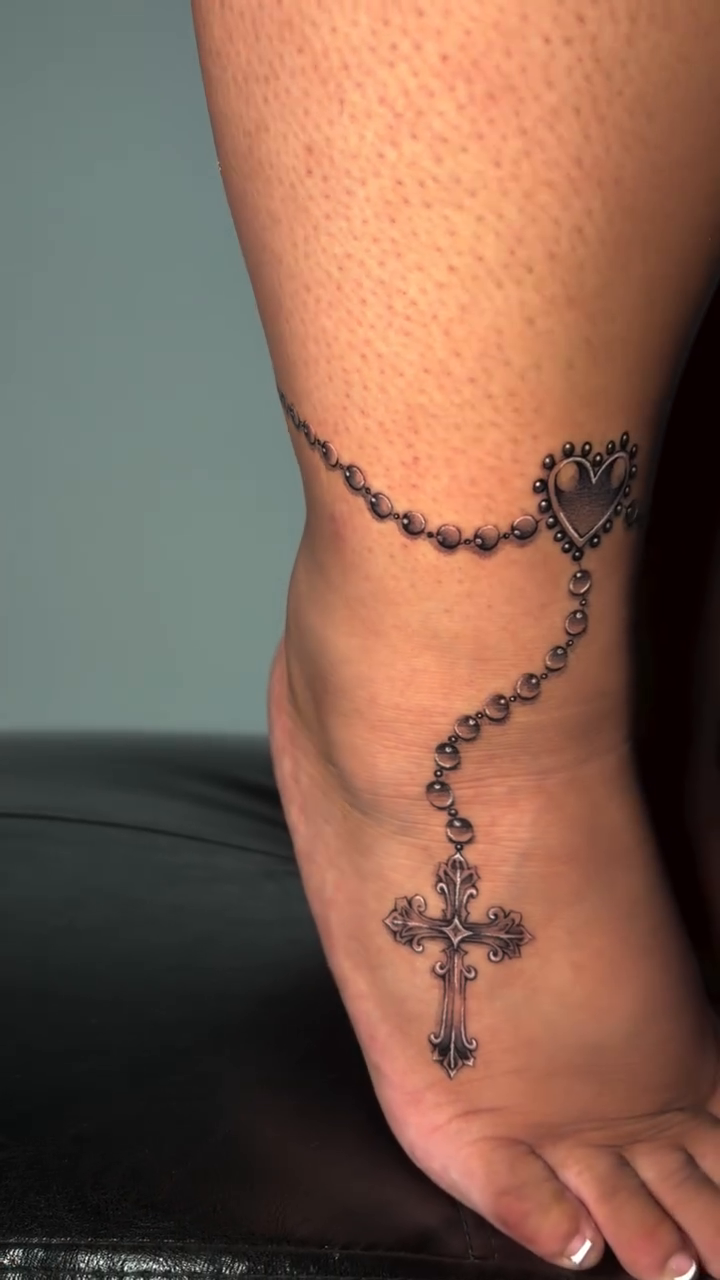 Tattoo by @vienna.tattoo — fine_line, black_and_grey