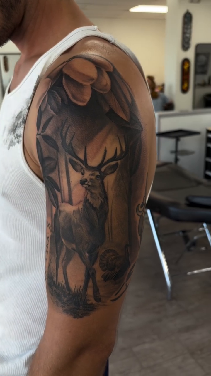 Tattoo by @elijahdejesus_art — realism, black_and_grey