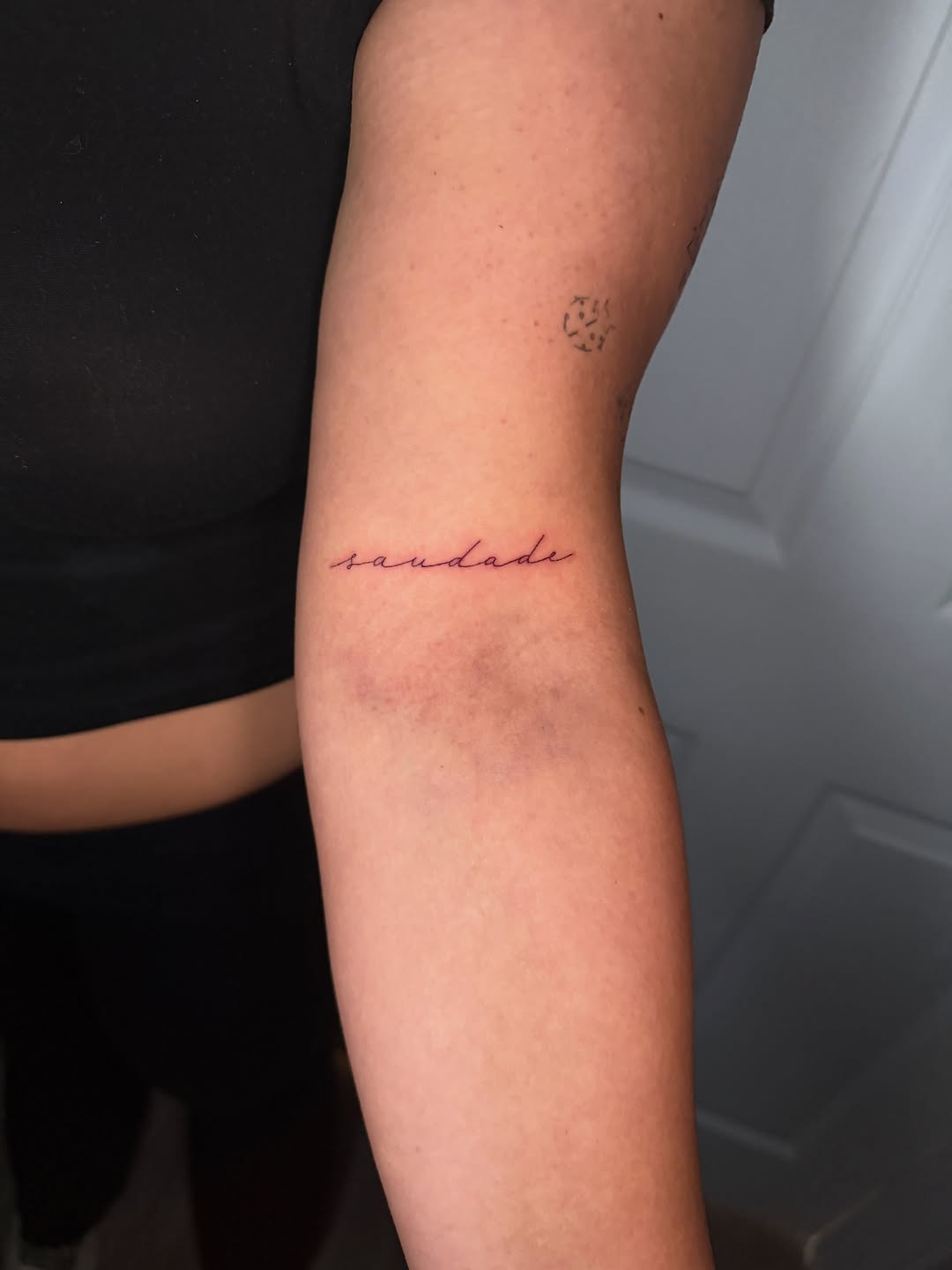 Tattoo by @nia.c__tattoo — lettering_script, fine_line