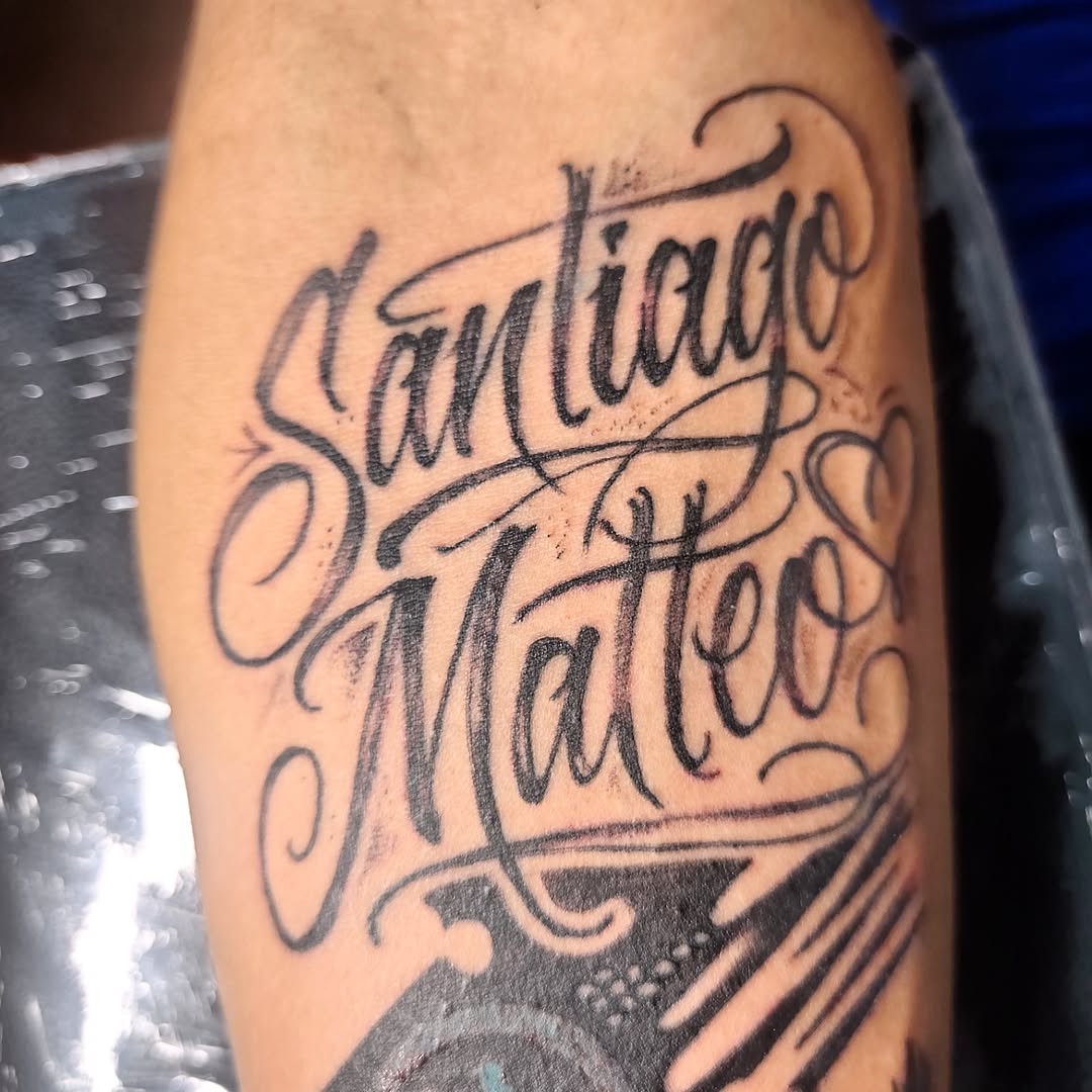Tattoo by @tintafinart — lettering_script, chicano