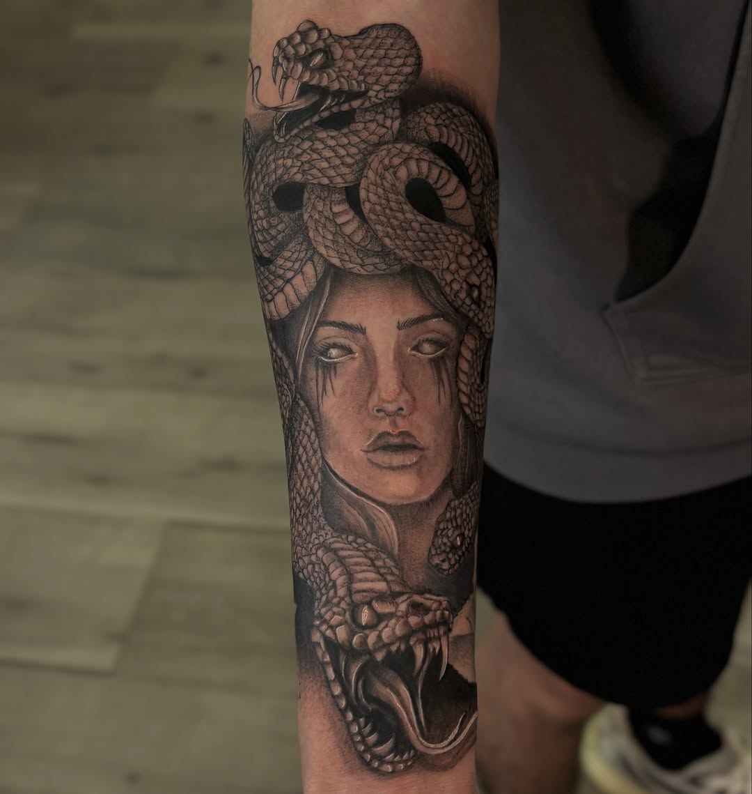 Tattoo by @_stabbygabby โ realism, black_and_grey