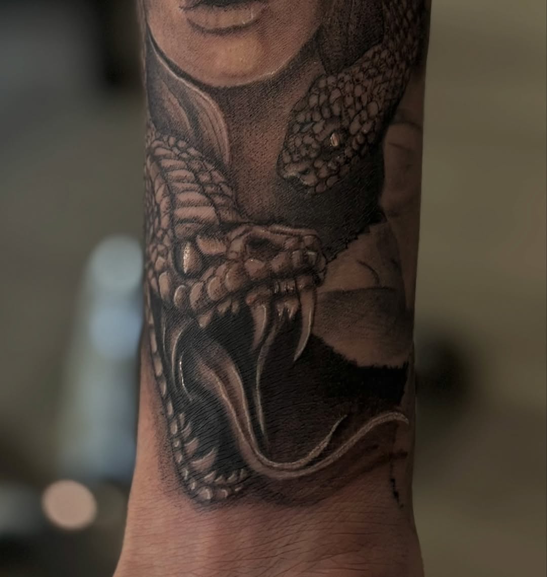 Tattoo by @_stabbygabby โ realism, black_and_grey