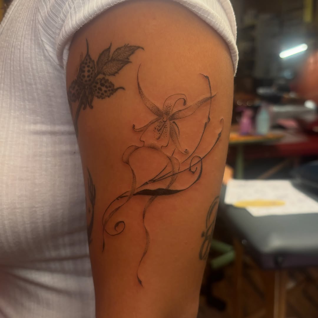 Tattoo by @xpg.ink — fine_line, black_and_grey