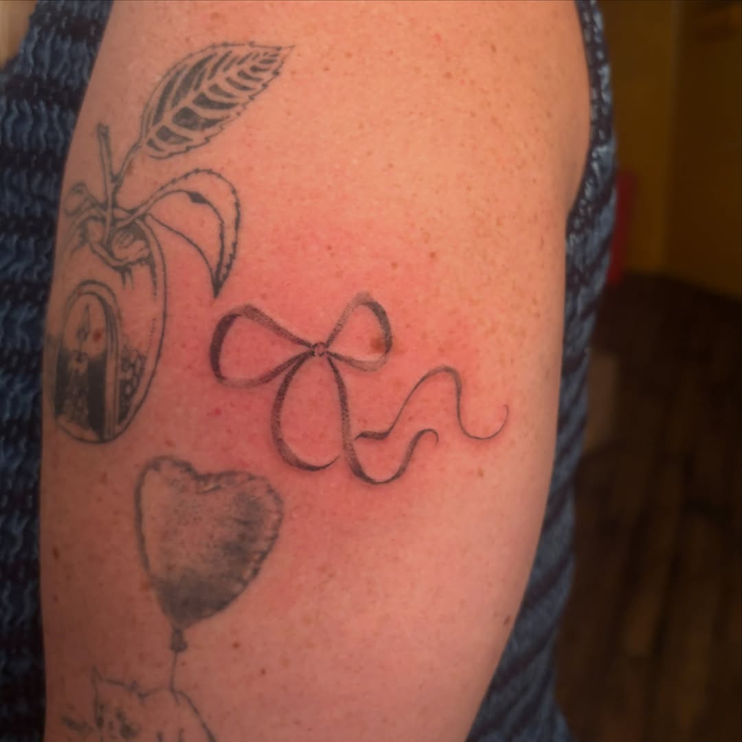 Tattoo by @xpg.ink — fine_line, black_and_grey