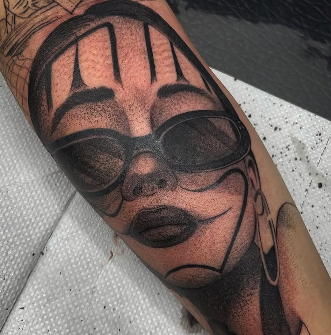 Tattoo by @dopeletterstattoo — chicano, black_and_grey