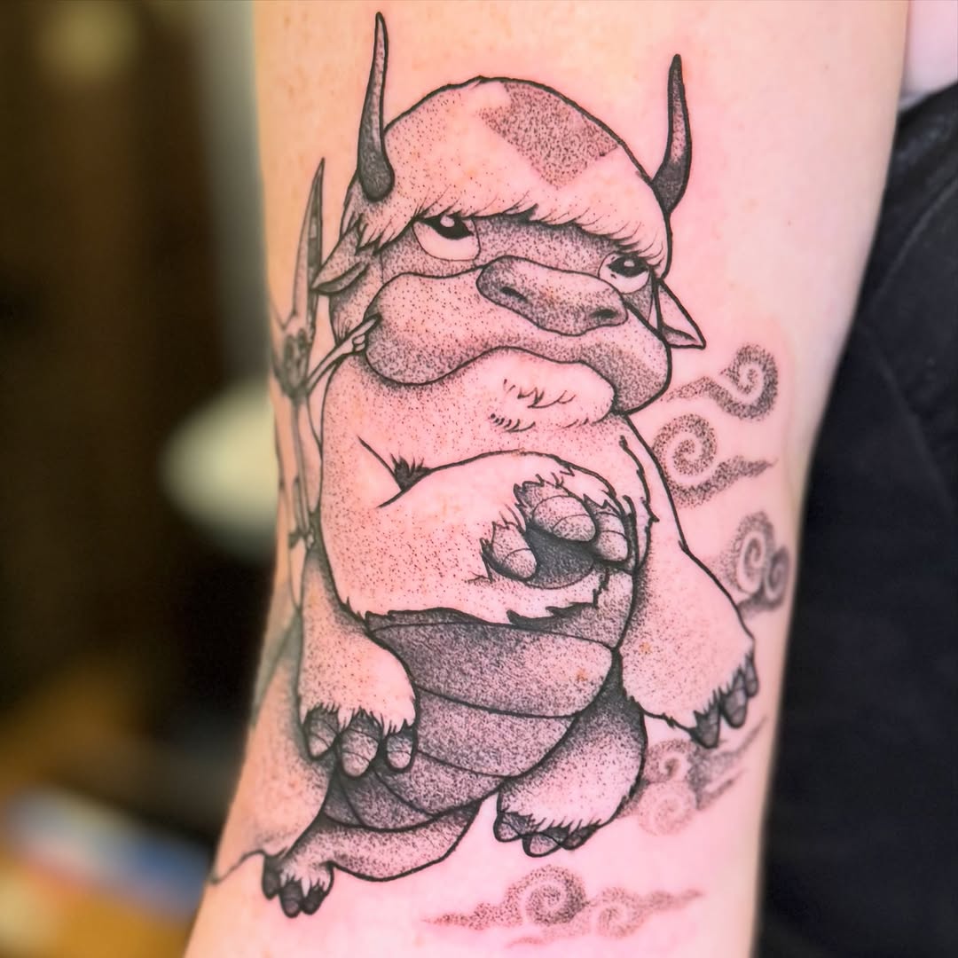 Tattoo by @rarepandatats — dotwork, illustrative
