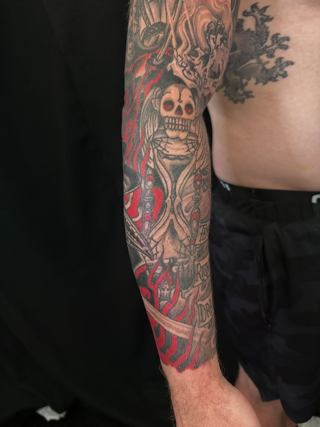 Tattoo by @electricunicorn — black_and_grey, trash_polka