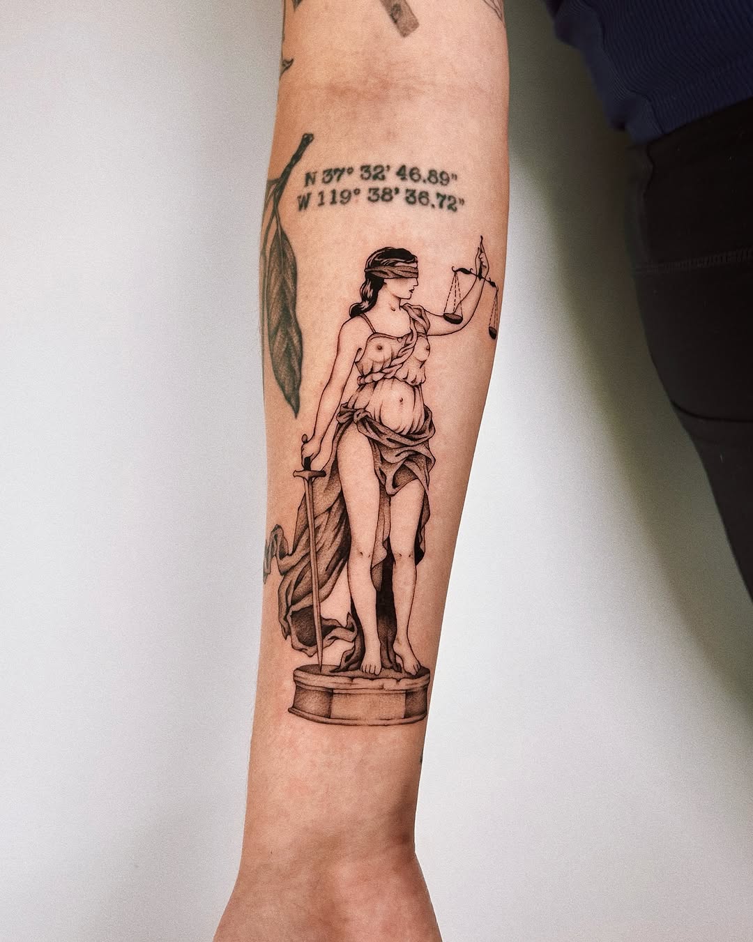 Tattoo by @ibuylemurs — black_and_grey, realism