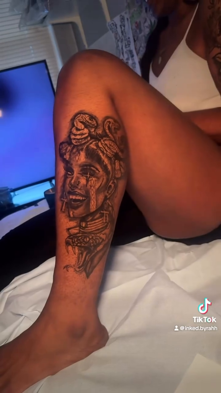 Tattoo by @inked.byrahh — realism, black_and_grey