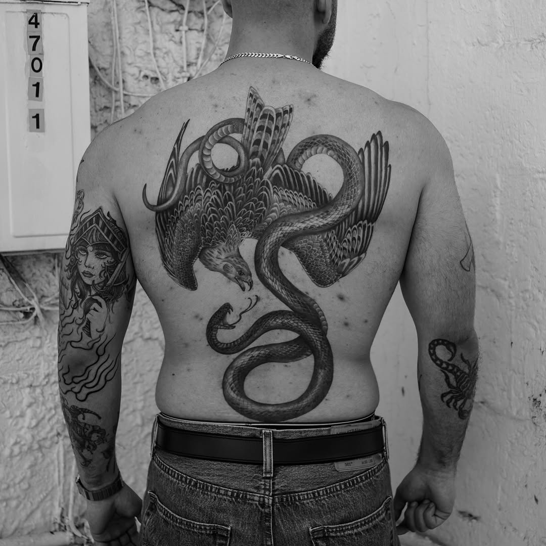 Tattoo by @chriscalibur_ — black_and_grey, realism