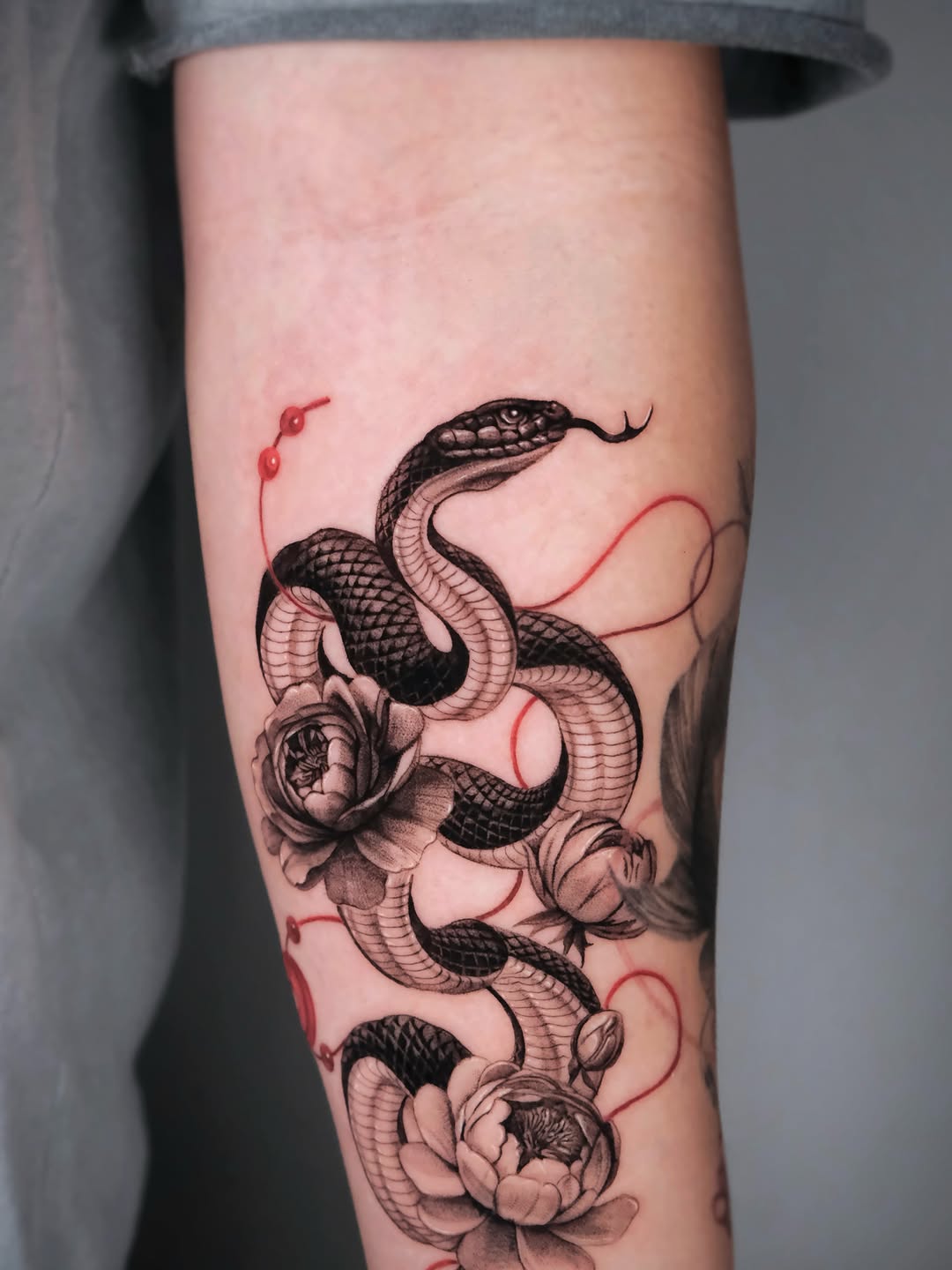 Tattoo by @da.an_tattooer — realism, black_and_grey