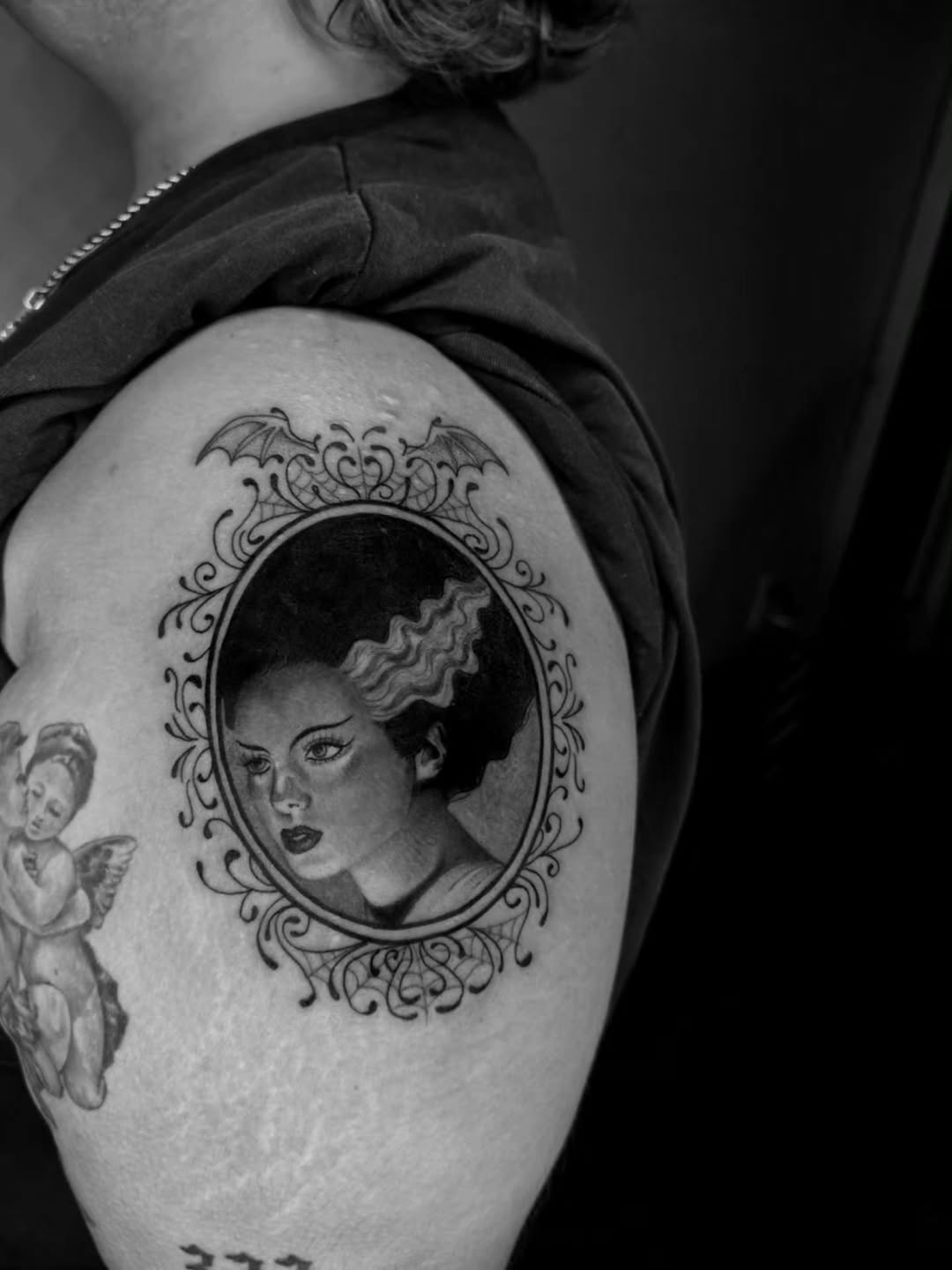 Tattoo by @emogirltattoo — realism, black_and_grey