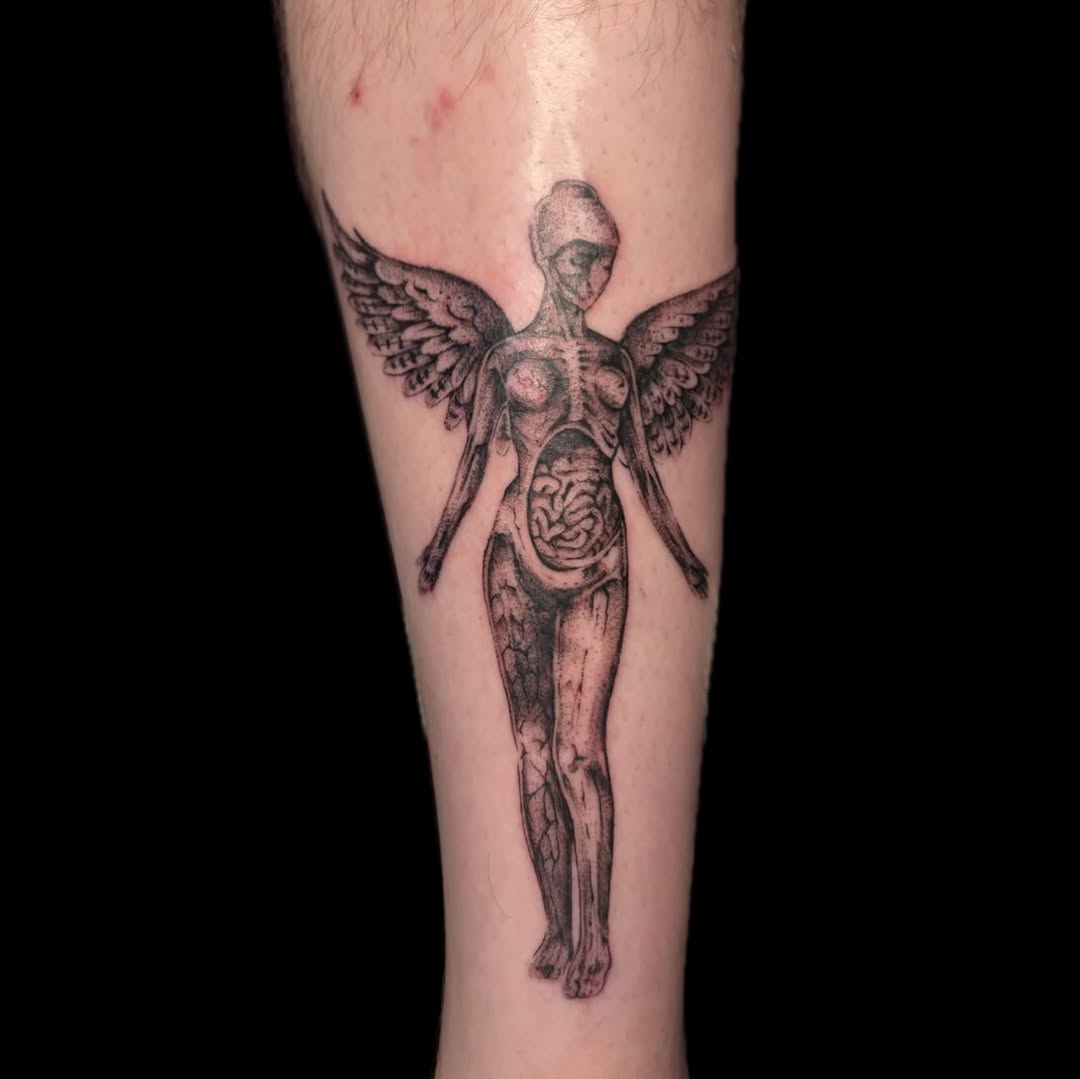 Tattoo by @piscesiscariot11 — black_and_grey, realism