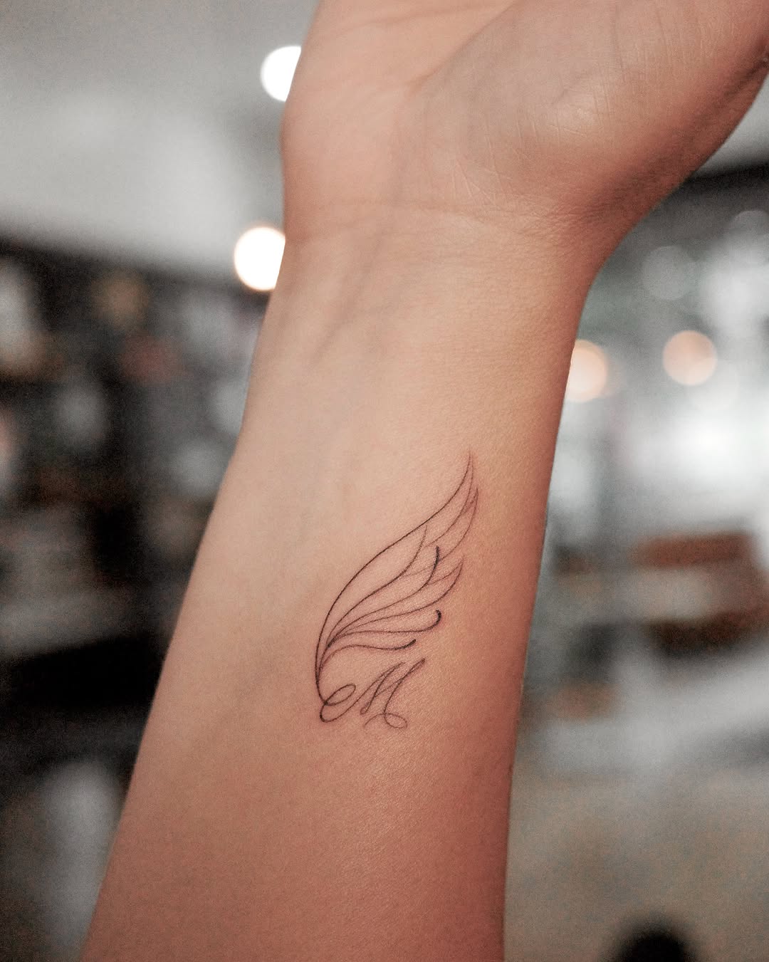 Tattoo by @blackpear_ink — fine_line, lettering_script