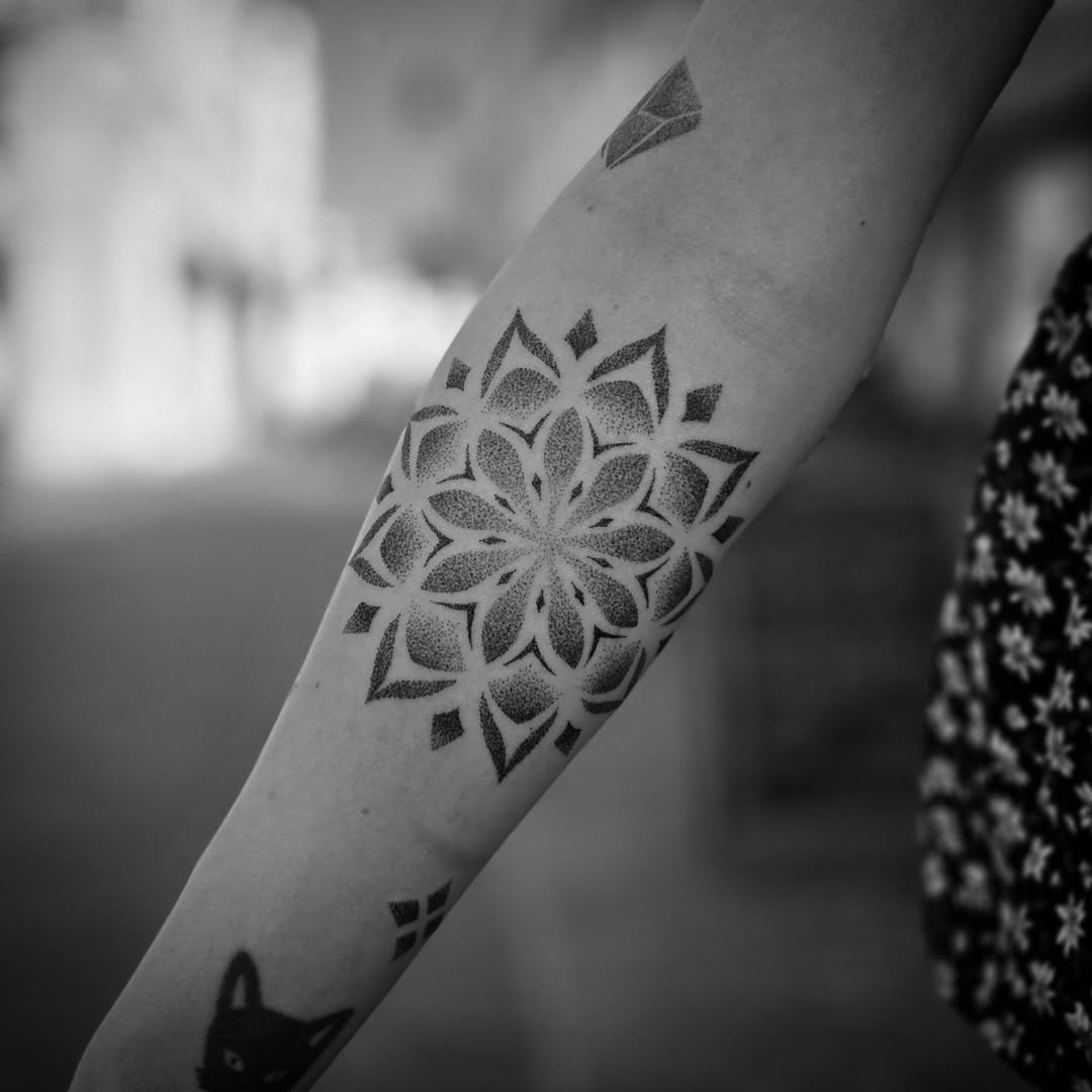 Tattoo by @aaronistattoo — dotwork, geometric