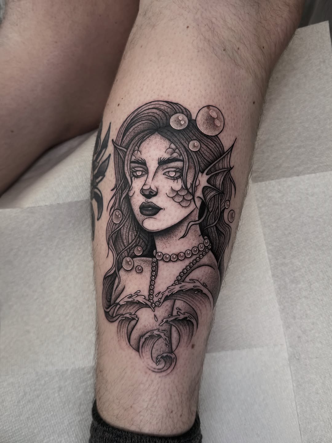 Tattoo by @midnight.spell.art — black_and_grey, fine_line