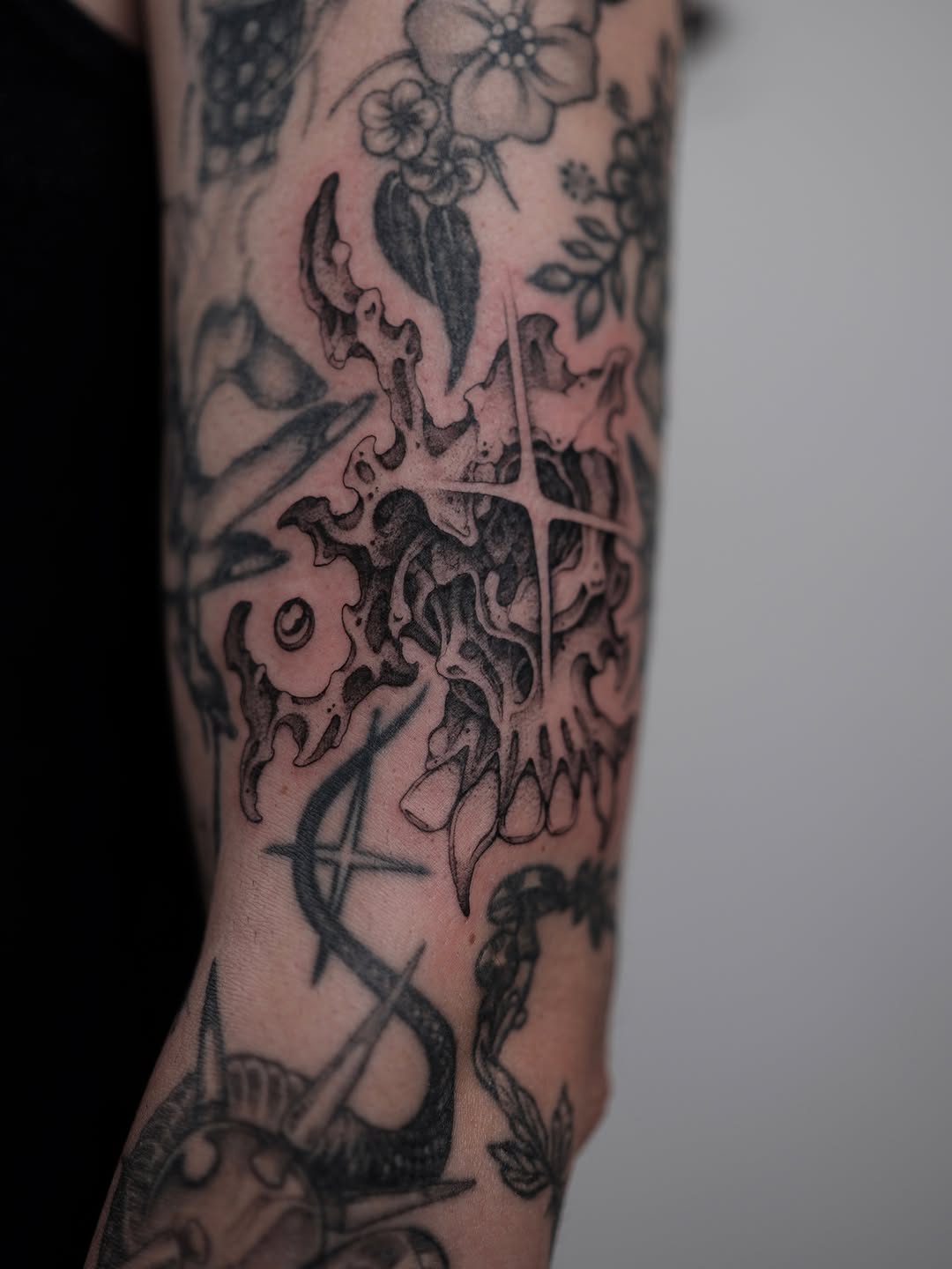 Tattoo by @ellafromhella — black_and_grey, dark_realism