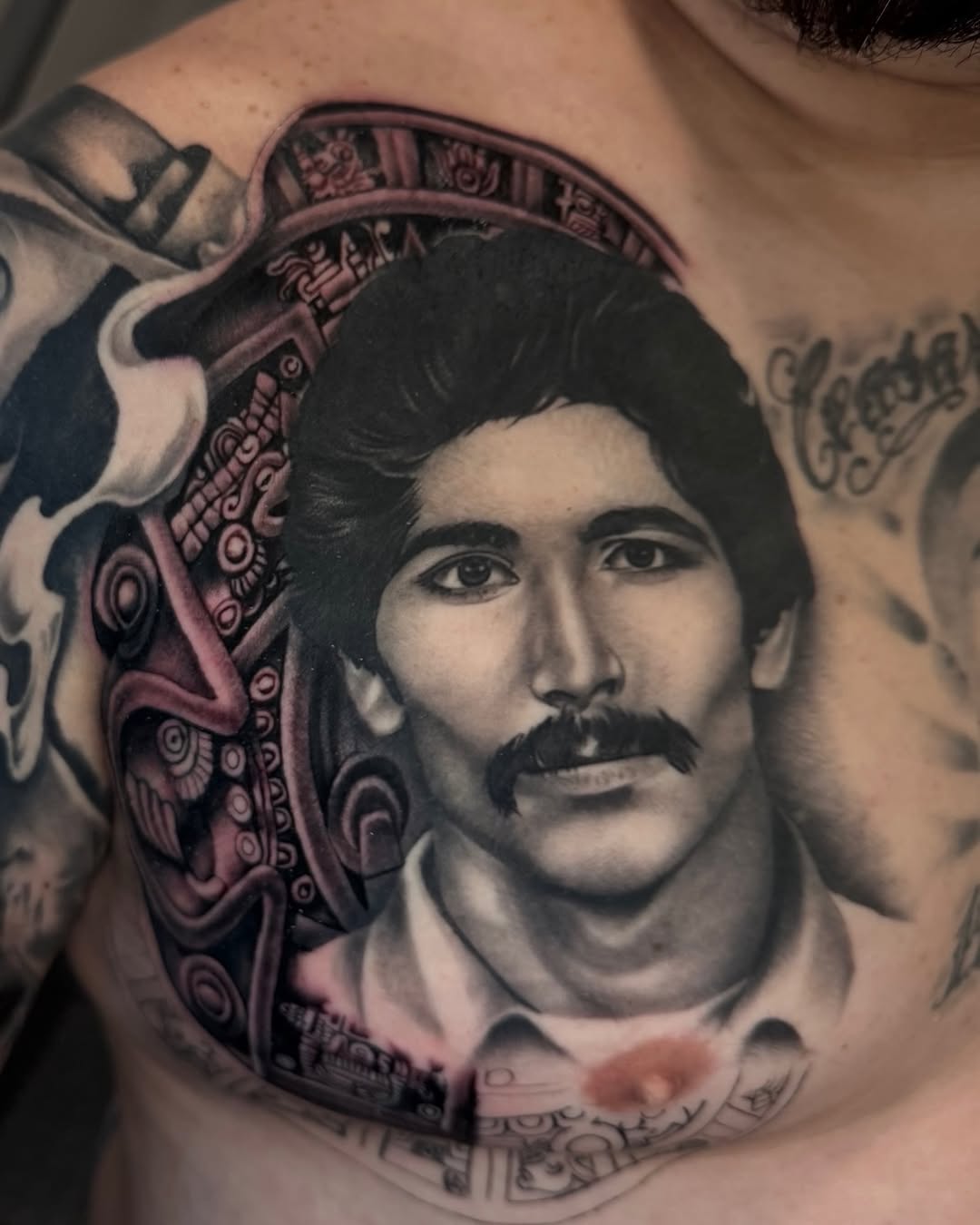 Tattoo by @q_tat2 — realism, black_and_grey