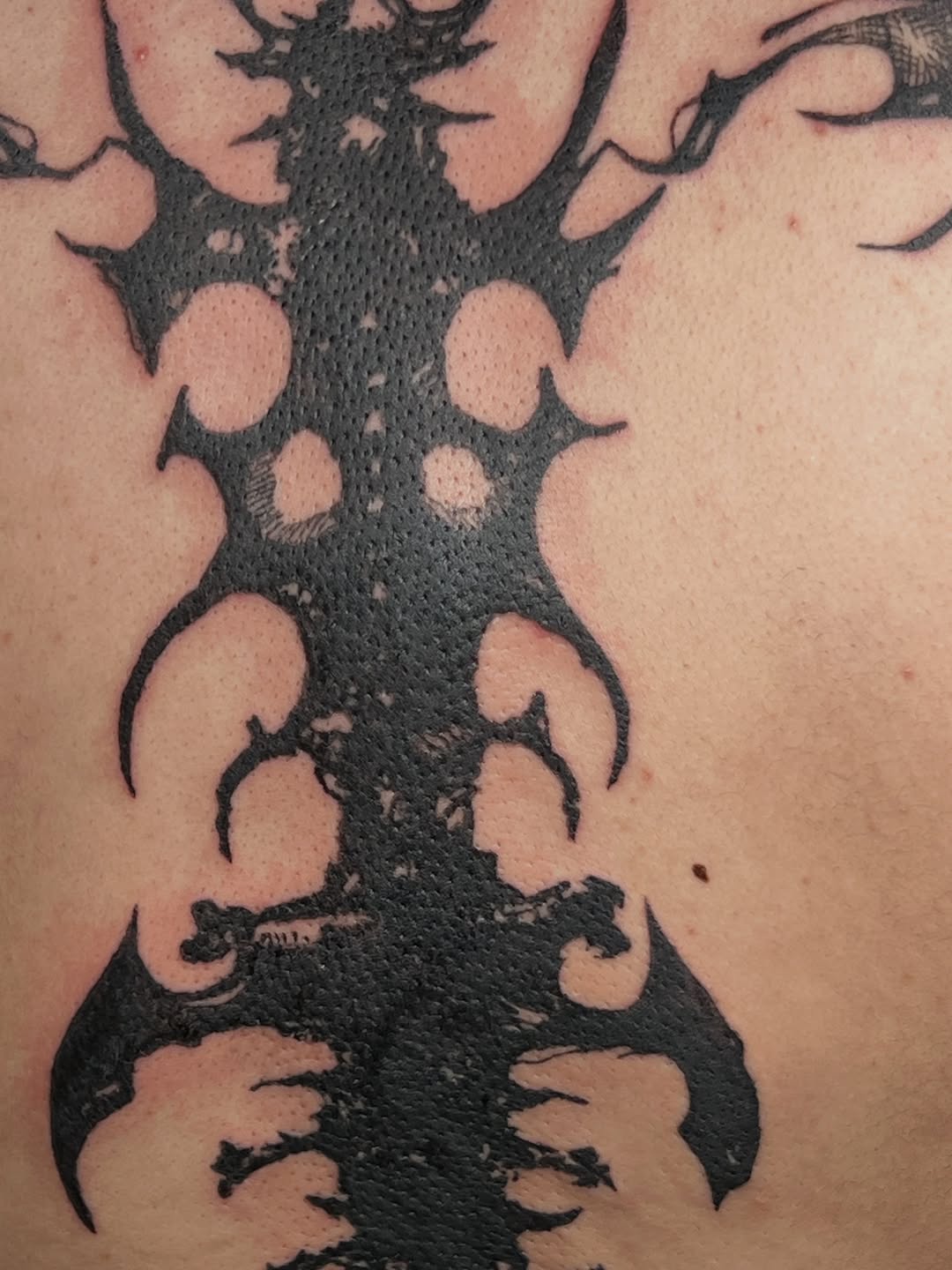 Tattoo by @666umbra.ttt — blackwork