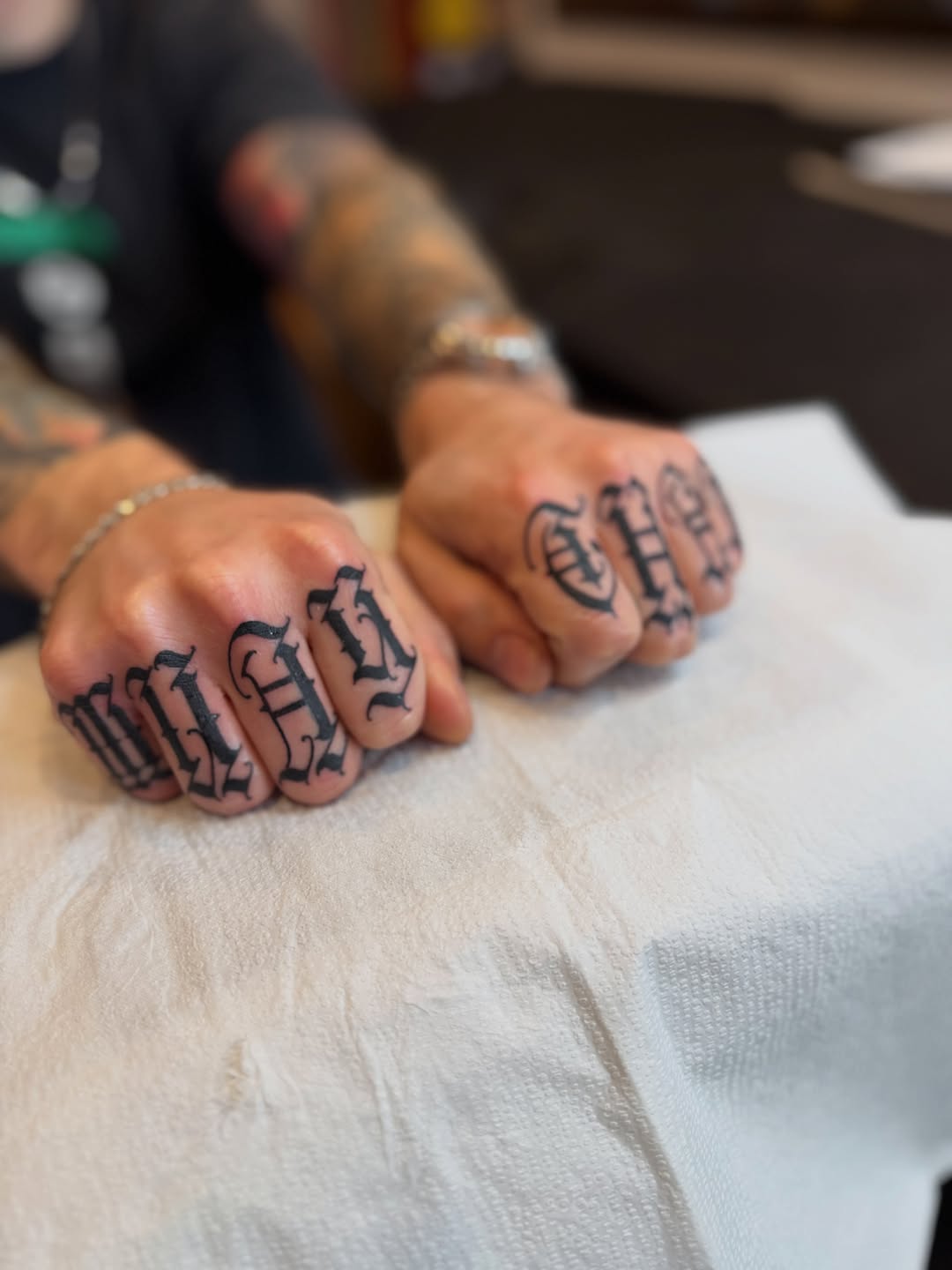 Tattoo by @deft_ink — lettering_script, blackwork
