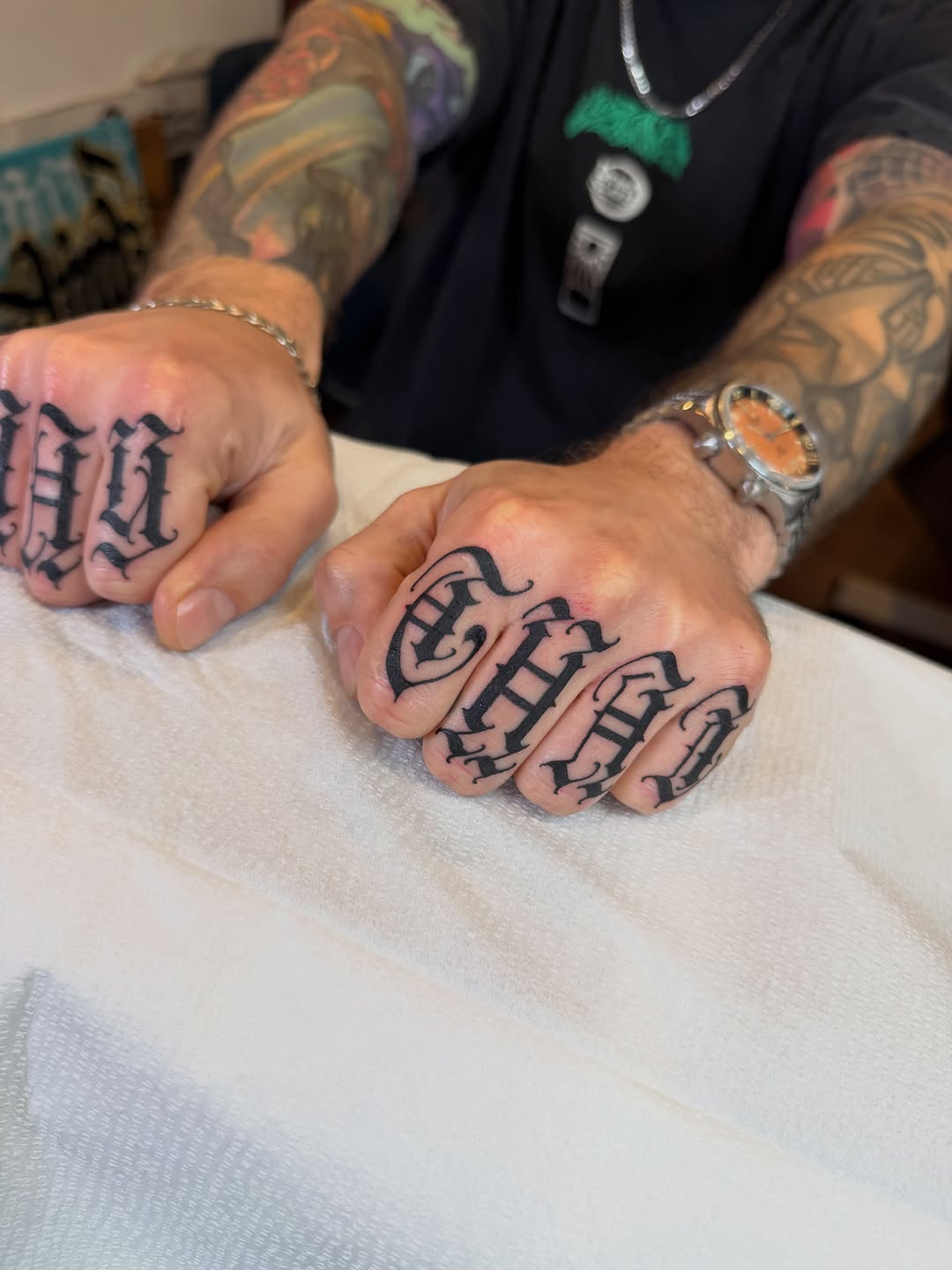 Tattoo by @deft_ink — lettering_script, blackwork