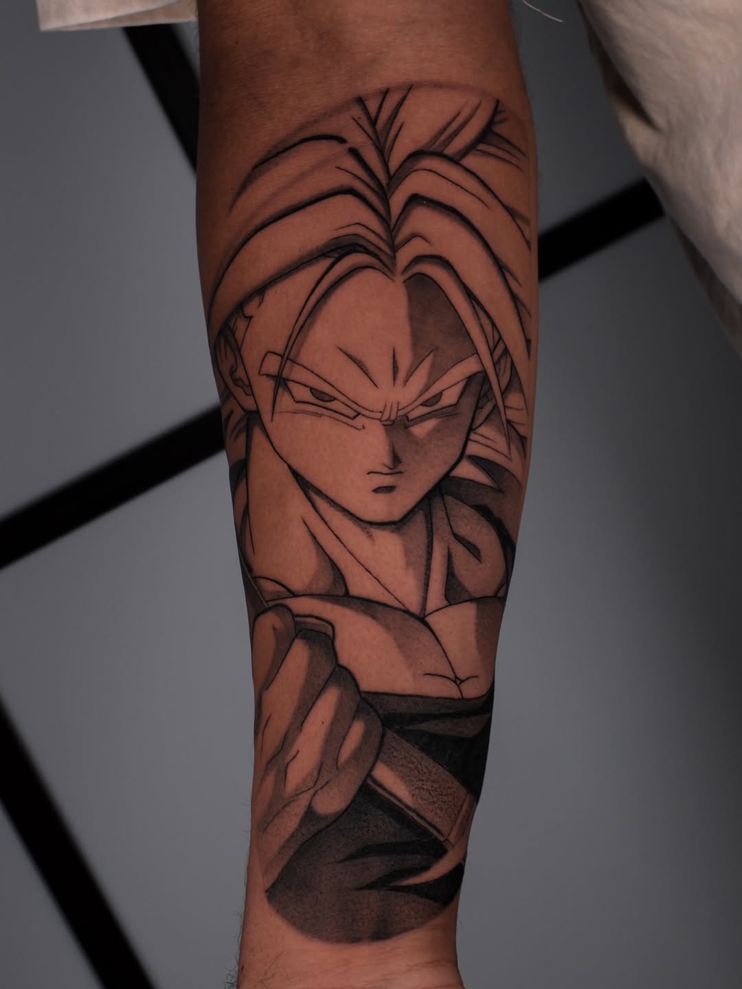 Tattoo by @yakir.tattooer — anime, black_and_grey