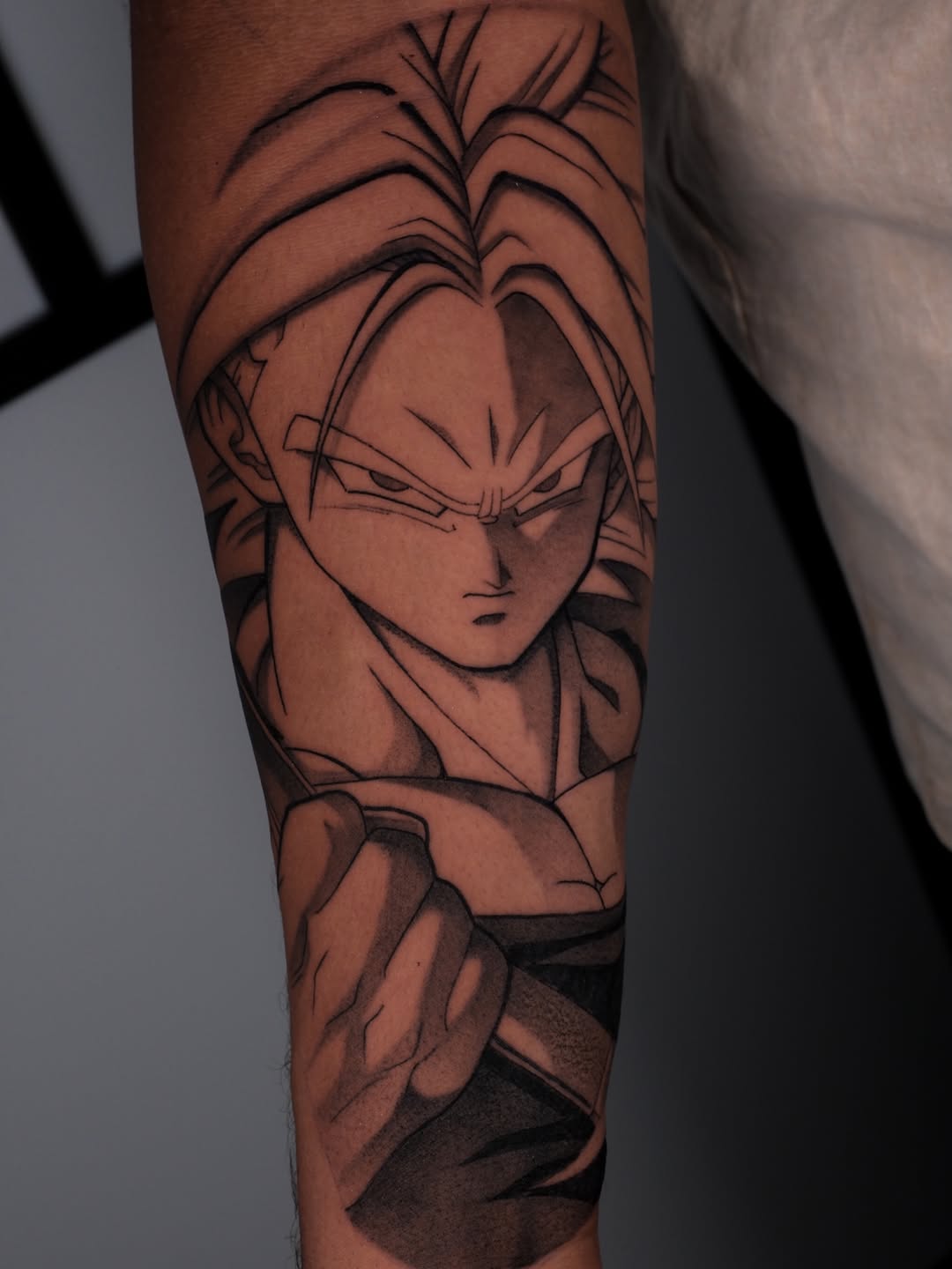 Tattoo by @yakir.tattooer — anime, black_and_grey