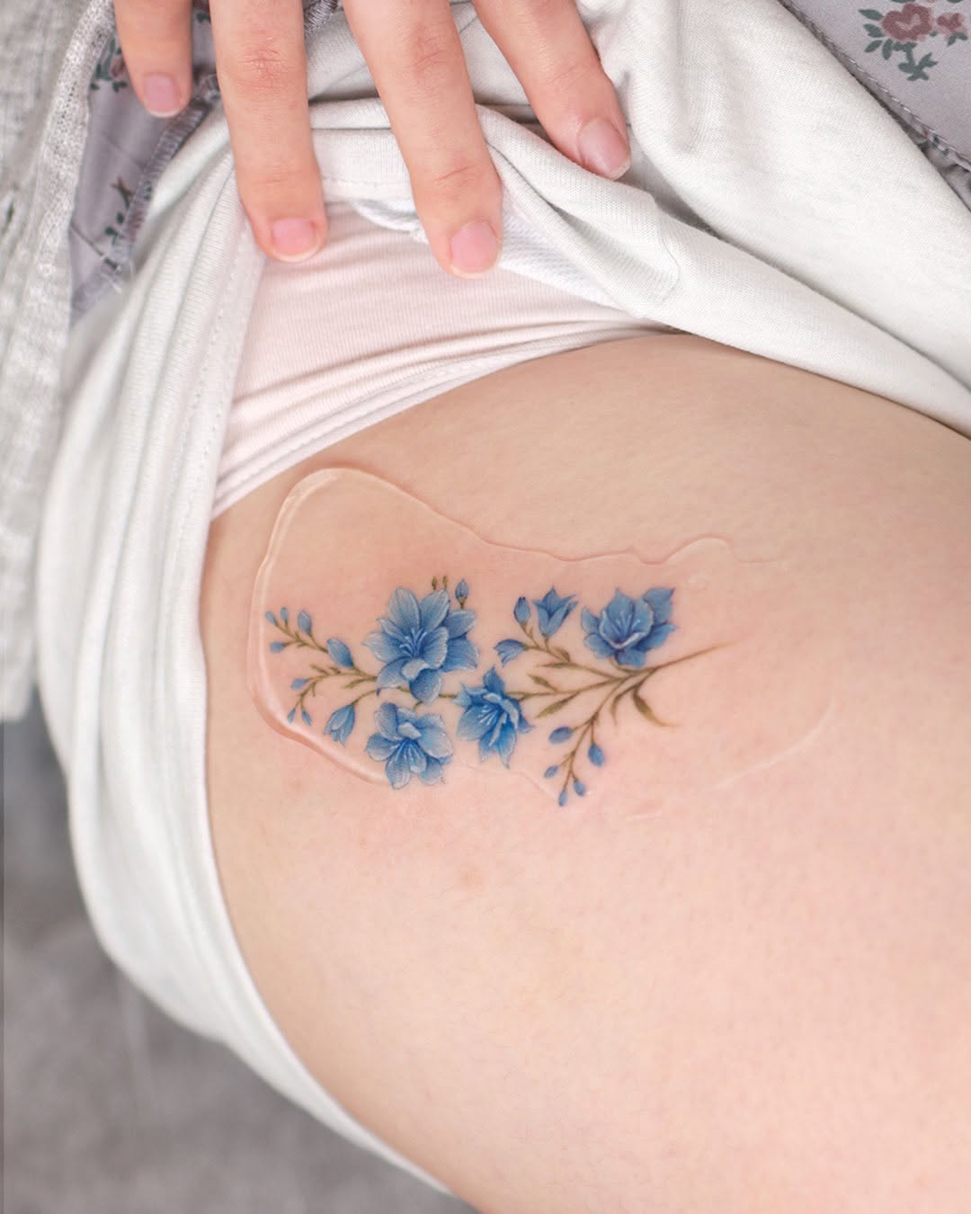 Tattoo by @zommi.tt — fine_line, watercolor