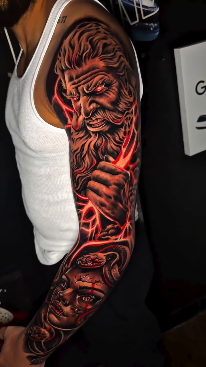 Tattoo by @jeisson.ink — realism, black_and_grey