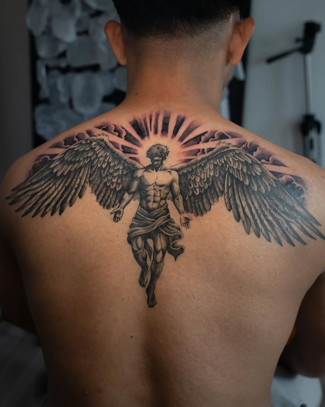 Tattoo by @blacksol.tattoo — realism, black_and_grey