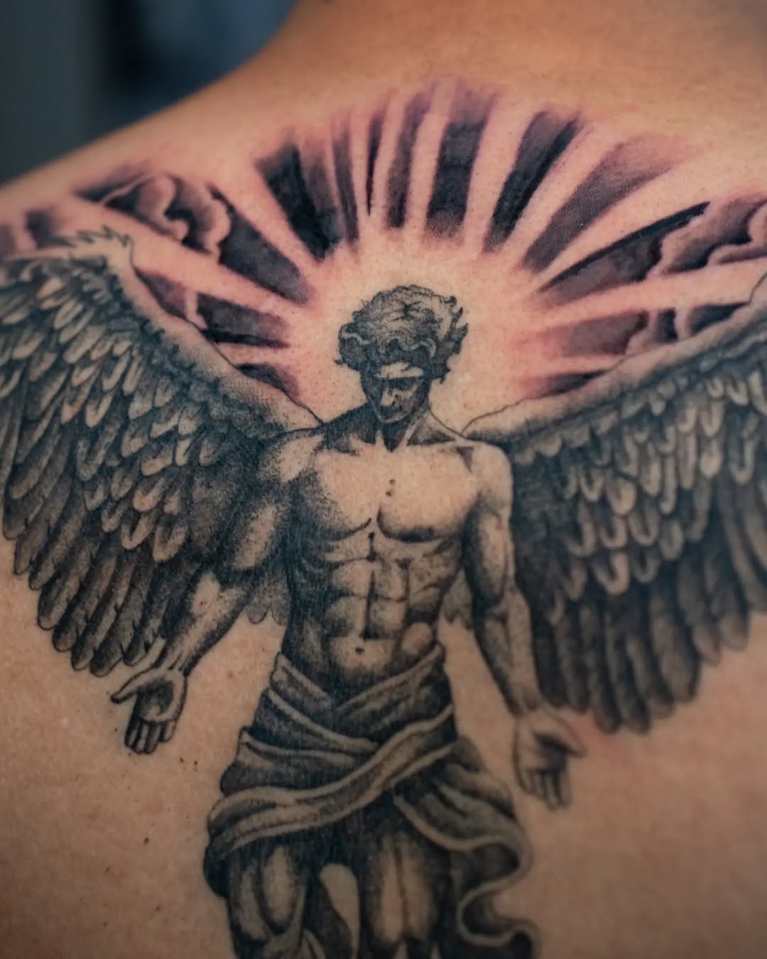 Tattoo by @blacksol.tattoo — realism, black_and_grey