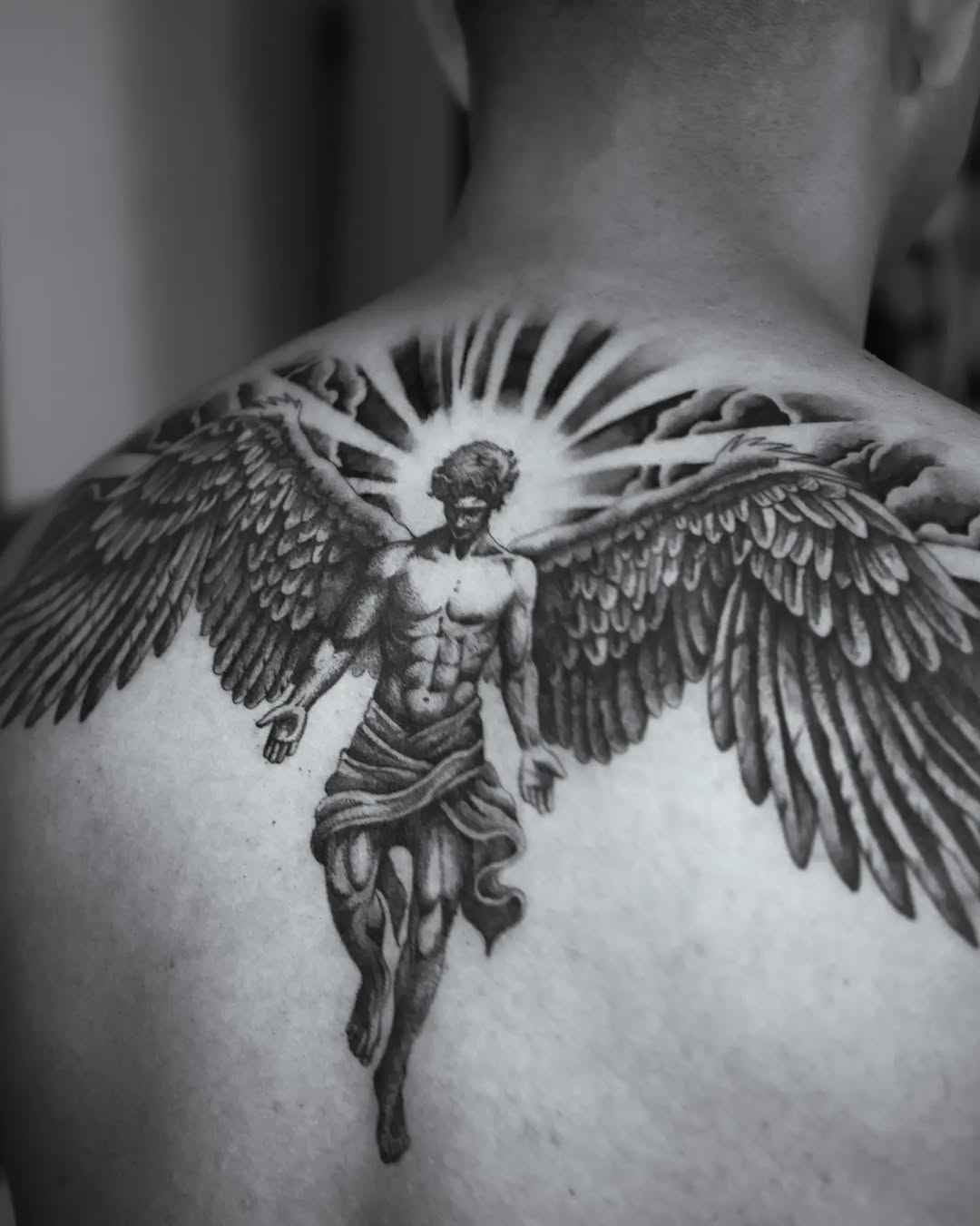 Tattoo by @blacksol.tattoo — realism, black_and_grey