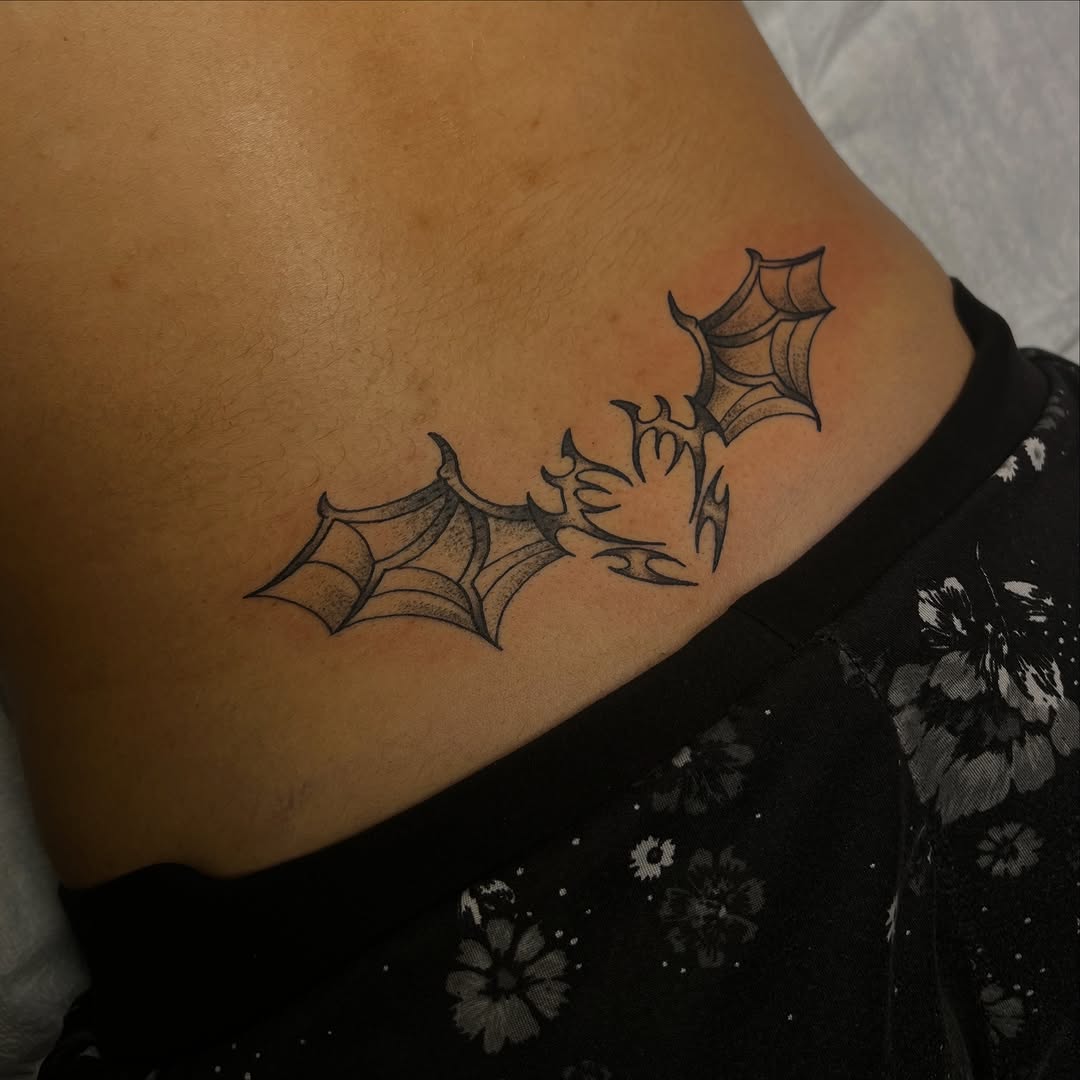 Tattoo by @lyvia.tattoo — blackwork, tribal