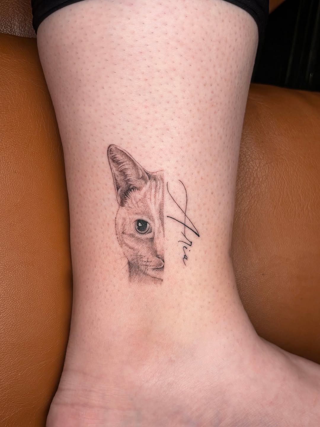 Tattoo by @eudokeotattoo — realism, lettering_script