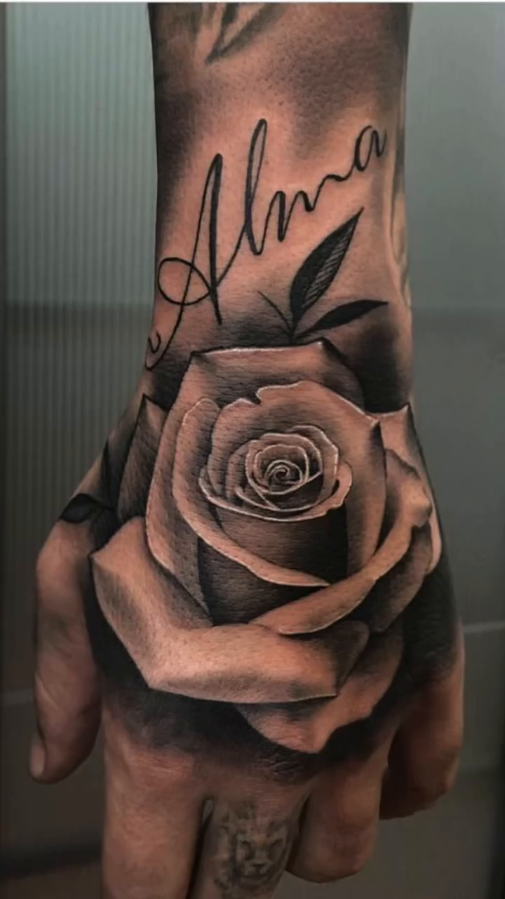 Tattoo by @mmf_tattoos — lettering_script, realism