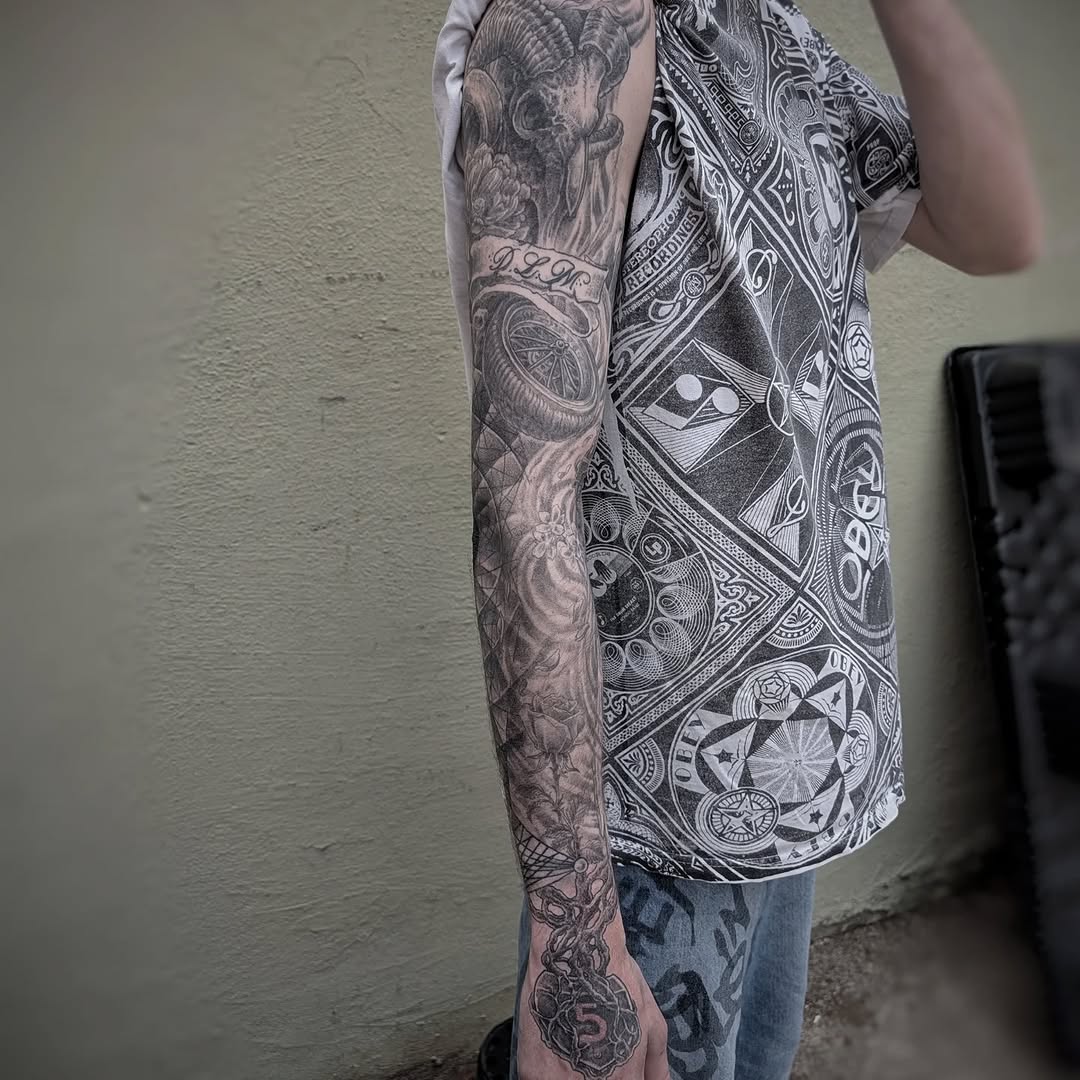 Tattoo by @graffitilostpdx — black_and_grey, realism