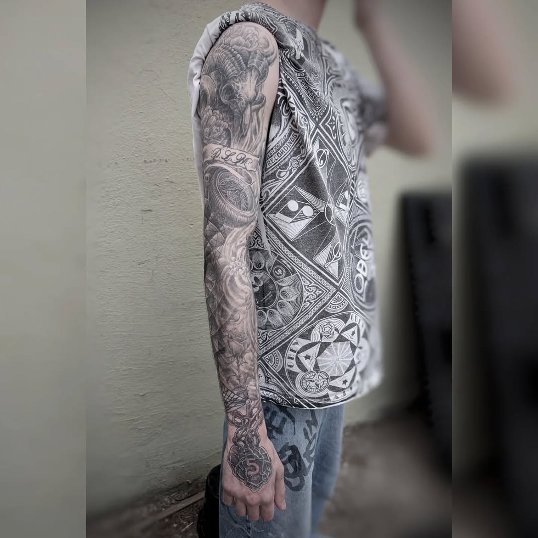 Tattoo by @graffitilostpdx — black_and_grey, realism
